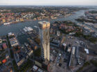 Overhead view of a tower under construction in the context of Gothenburg's port district