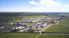 Wide-angle aerial view of the U.C. Merced campus showing the surrounding fields of the San Joaquin Valley.