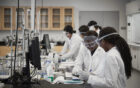 Students conducting experiments in the Sustainability Research and Engineering Building at the University of California, Merced.