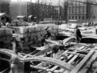 Rafael Guastavino standing on tile arches at the construction of the Boston Public Library, 1889.