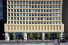 Street level view of midcentury office tower in Chicago