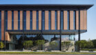 University building with glass, brick and steel facade.