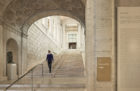 Staircase inside a museum lobby