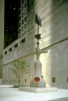 A modern sculpture in an urban plaza